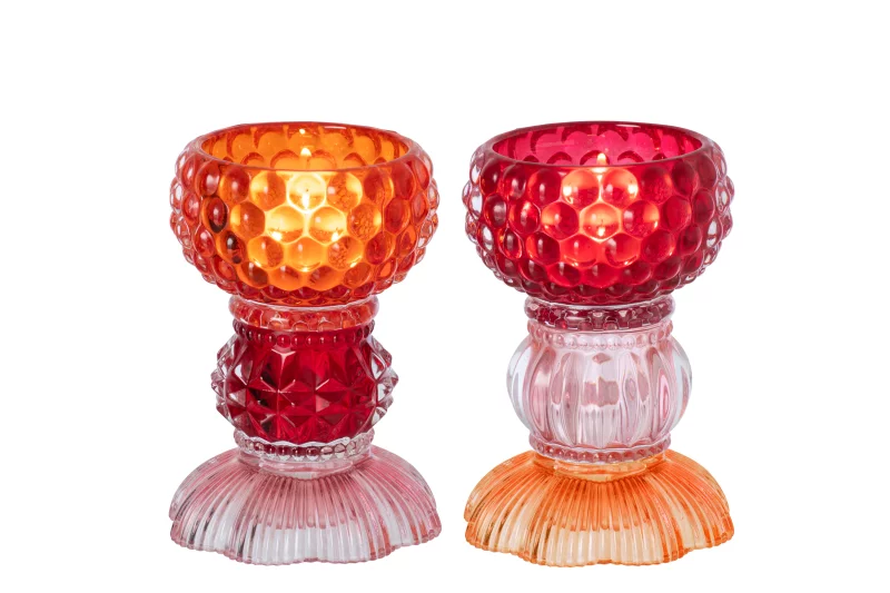 Glazen kandelaar oranje/rood bij zijden boutique in Delft
